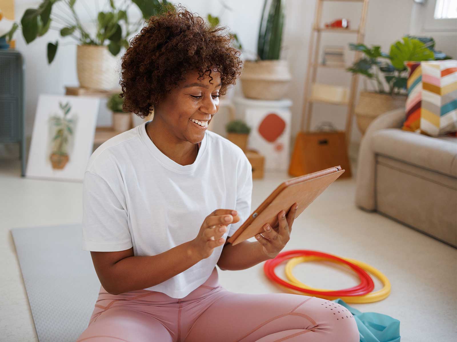 woman using her corporate wellness program benefits