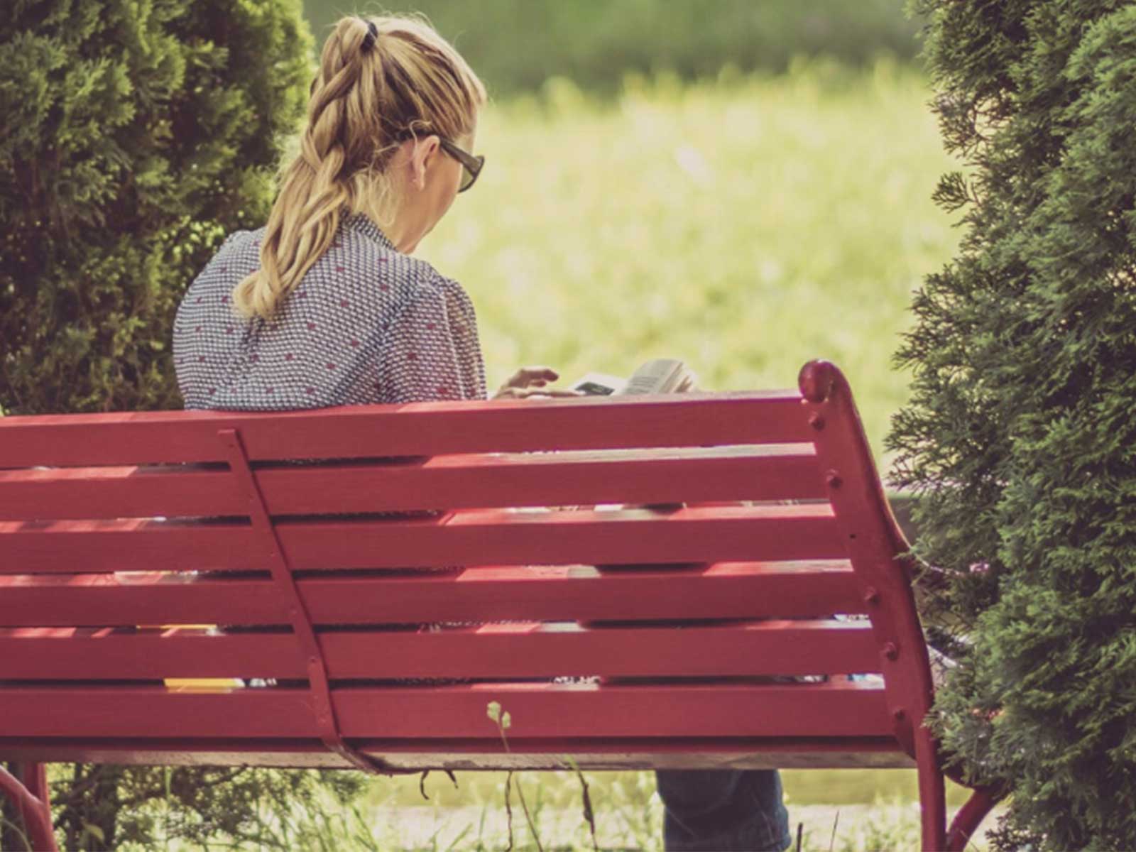 Woman reading a mental health book