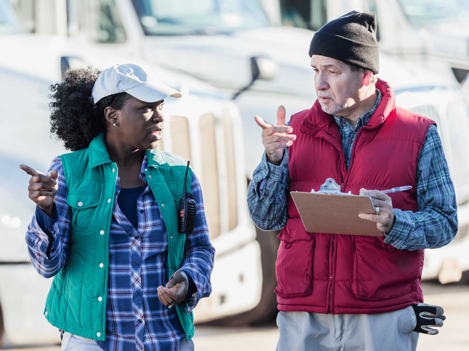 Employee discussing wither her manager how to get leadership feedback and support for well-being programs