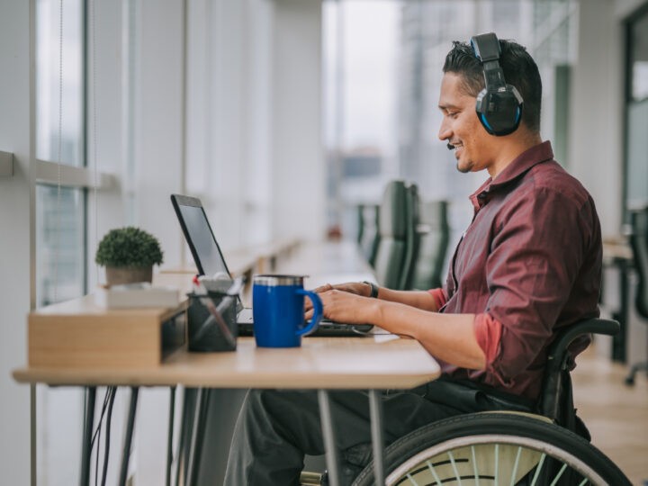 Employee reading the Complete Guide to Employee Engagement