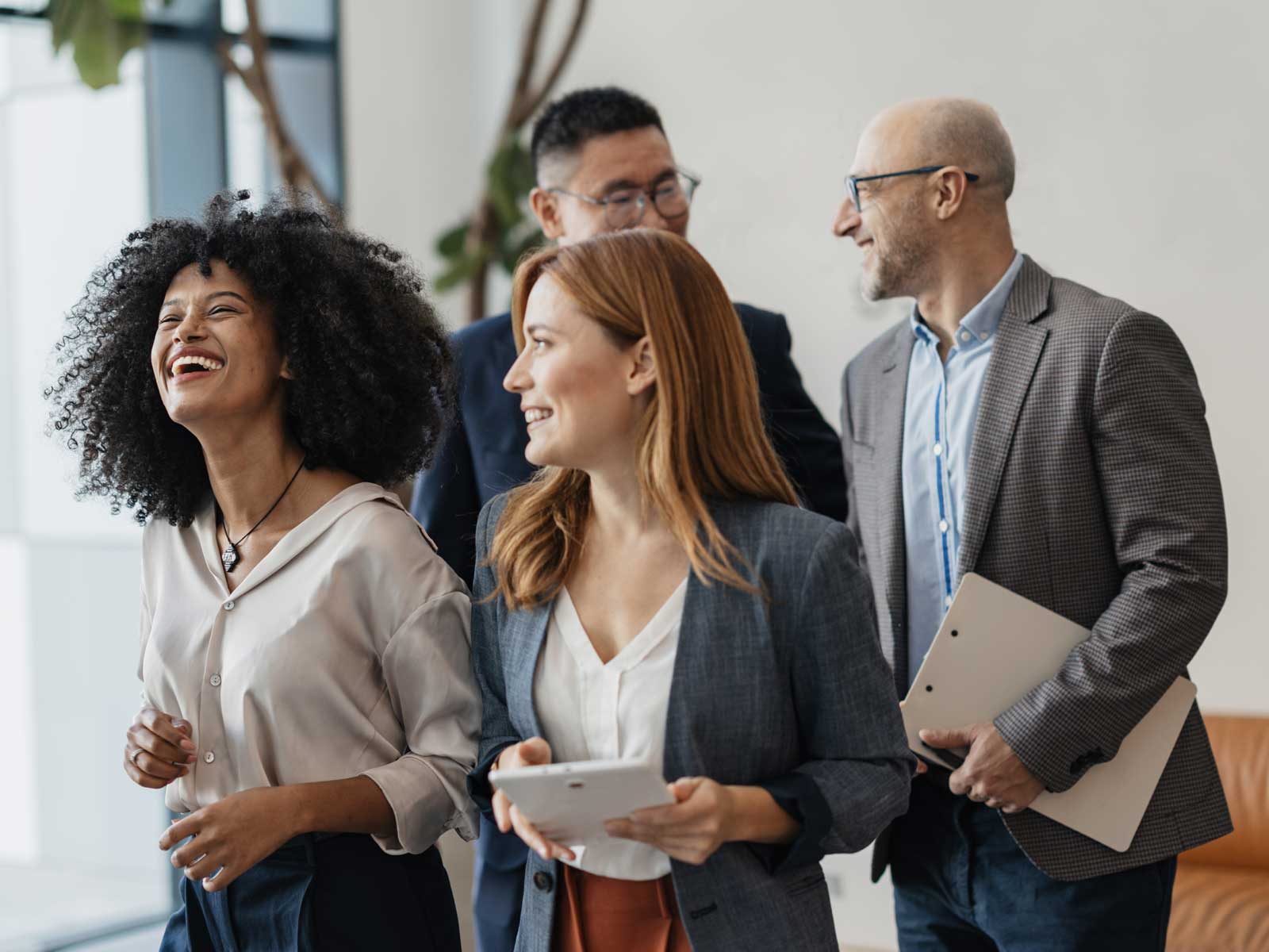 Co workers walking and talking