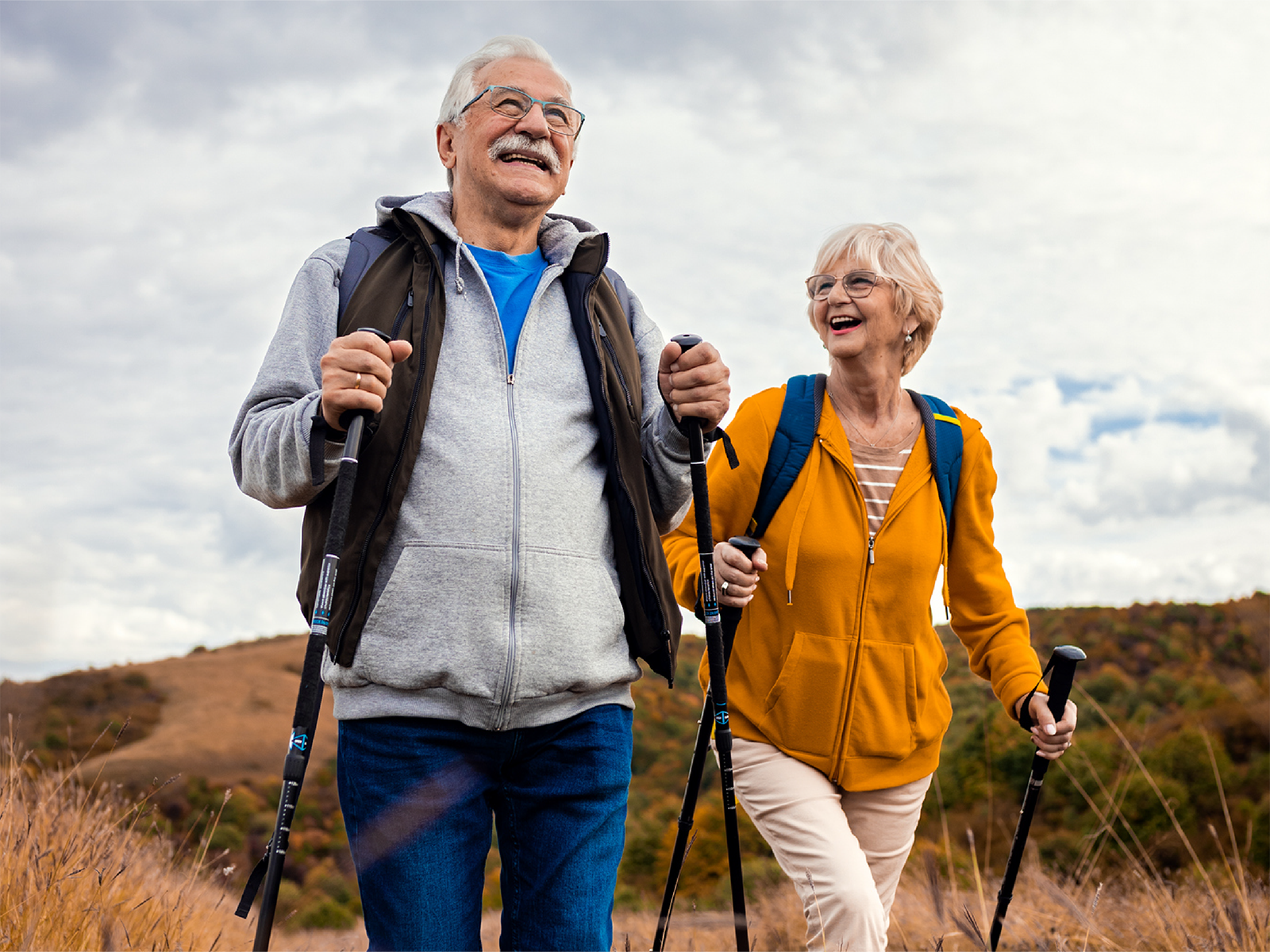 elderly couple hiking