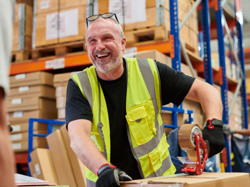 smiling warehouse worker