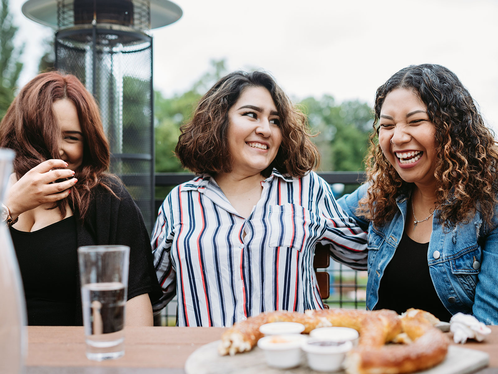 three employees at a happy hour