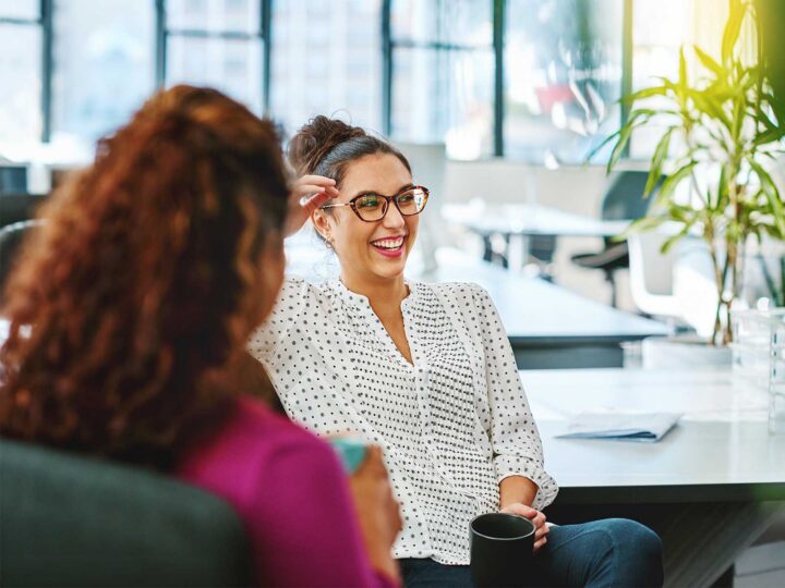 Two female employees at work